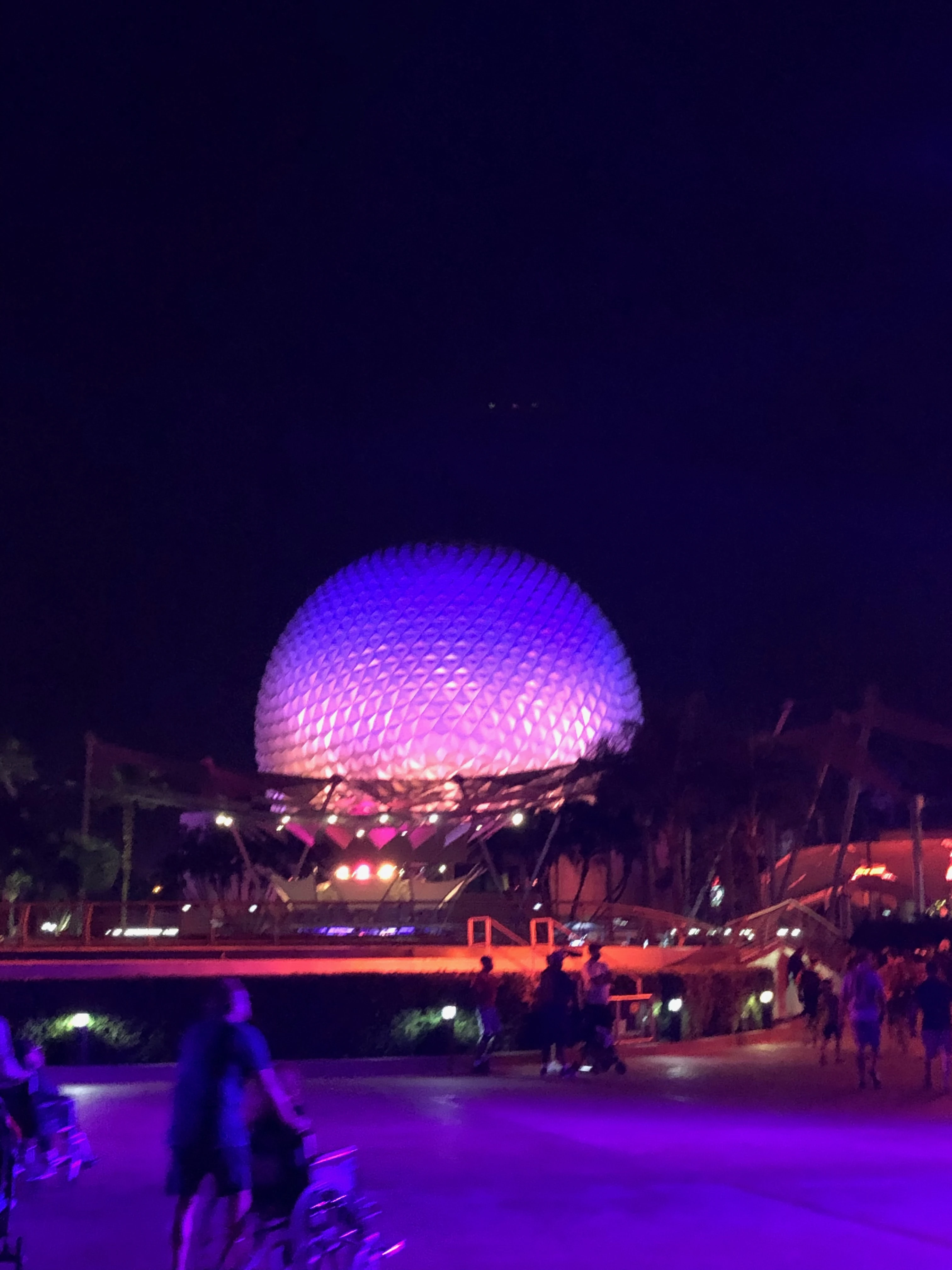 Family unpacking grocery delivery in Disney resort room with snacks and essentials