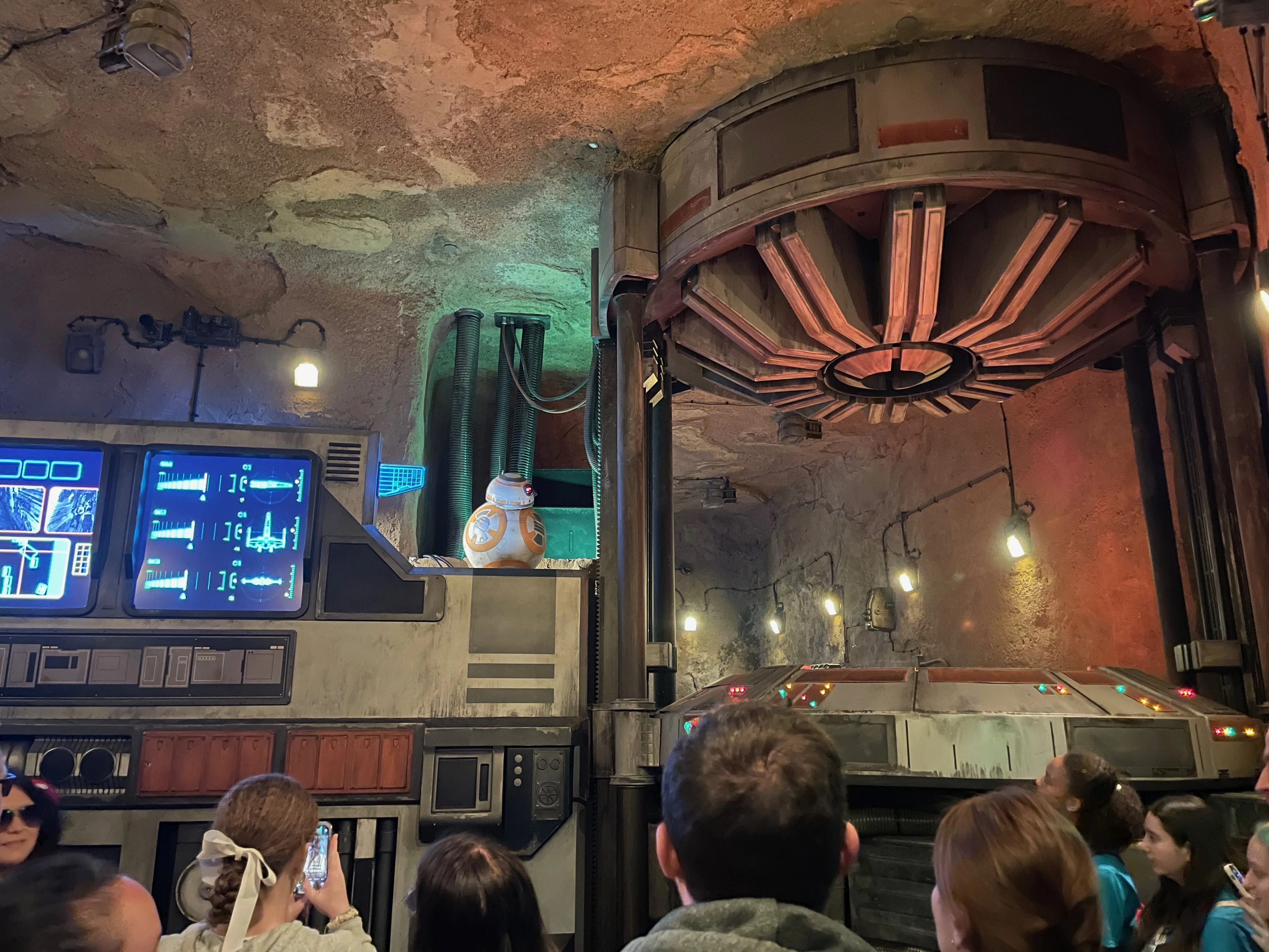 Massive waves crashing in Typhoon Lagoon's surf pool with families enjoying the water