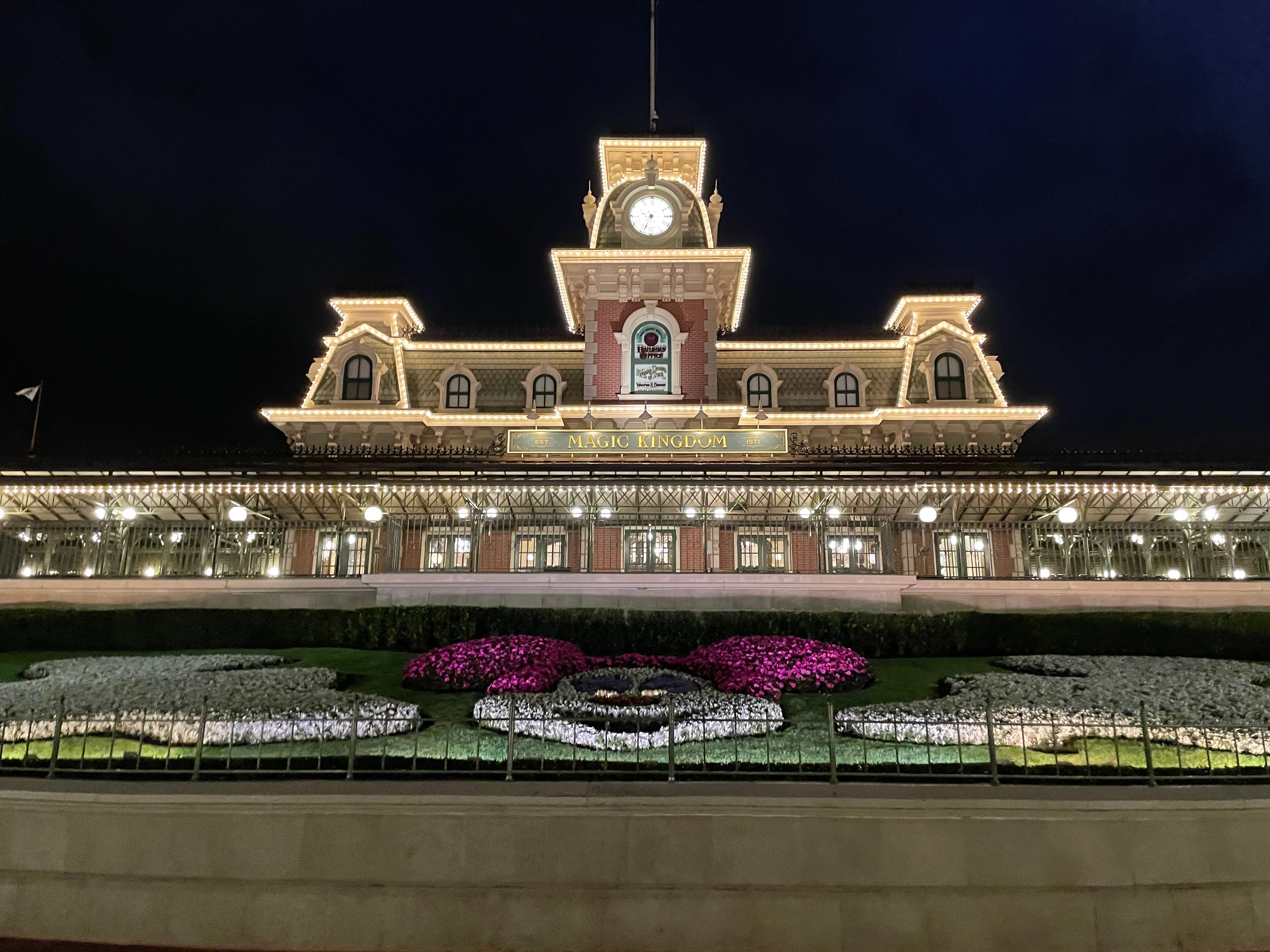 Cinderella Castle dramatically lit against the night sky showing the premium Disney experience